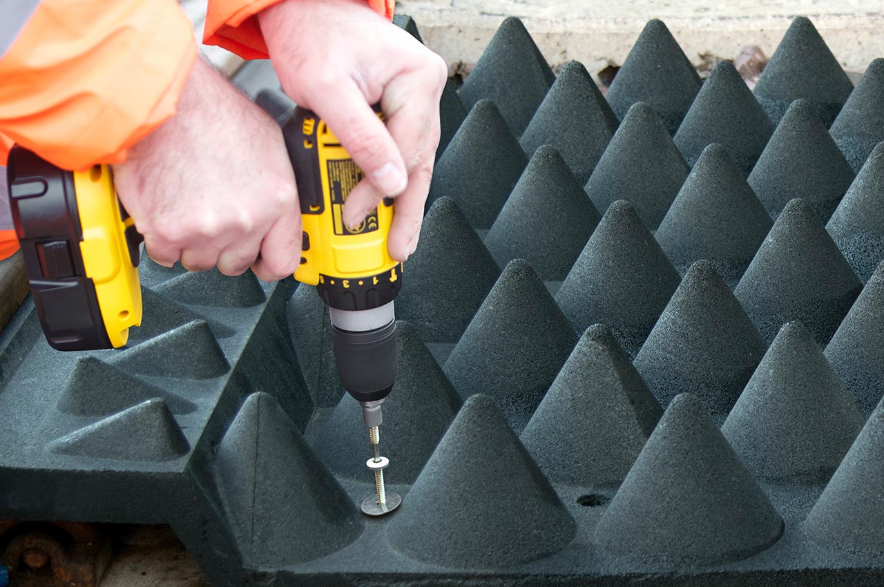 Anti-trespass panel fitting in progress