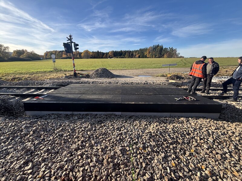 Workers walking along the completed StrandLock crossing