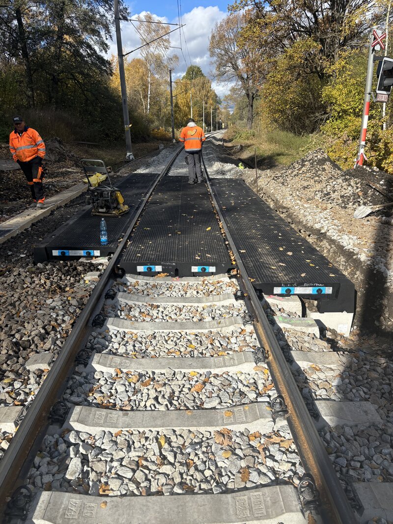 Completed StrandLock crossing viewed along the track with autumn trees